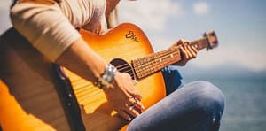playing a guitar